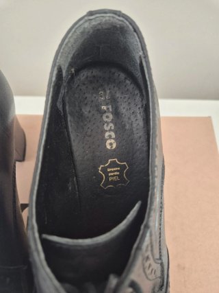 Zapatos de tacón negros estilo Oxford. Piel