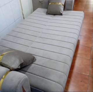 Divano letto grigio in tessuto