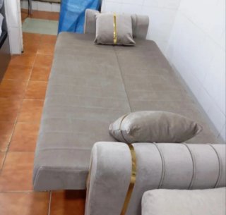 Divano letto grigio in tessuto