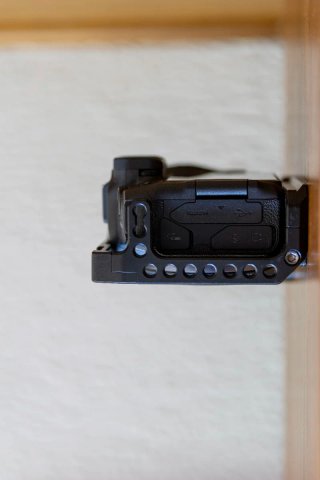 Canon EOS RP con jaula y baterías