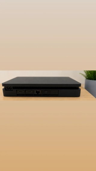 PS4 Slim 1TB + 2 mando + juegos | Muy cuidada