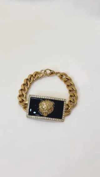 Pulsera eslabones dorados con león estilo versa
