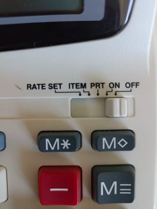 Calculadora Sigma TRS 712 con impresora + rollos