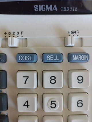 Calculadora Sigma TRS 712 con impresora + rollos