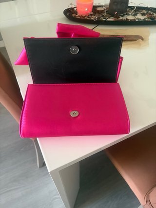 Bolso de fiesta fucsia con lazo