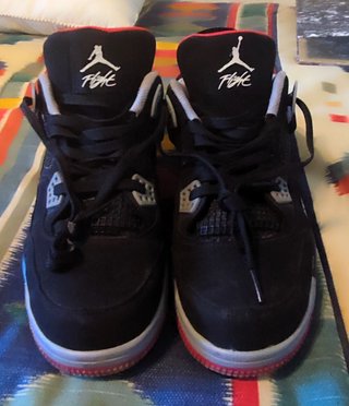 Zapatillas Jordan 4 Negras y Rojas