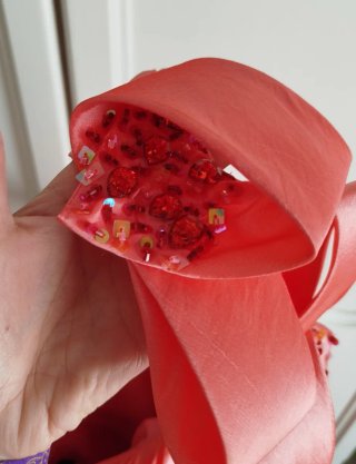 Vestido coral asimétrico con lazo