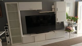 Muebles salón blanco con vitrina cristal