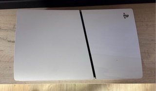 PS5 Slim Blanca + Gran Turismo 7