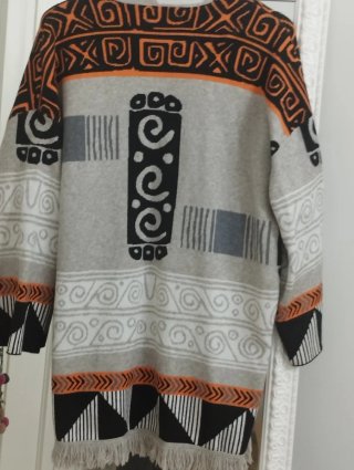 Chaqueta de punto con flecos