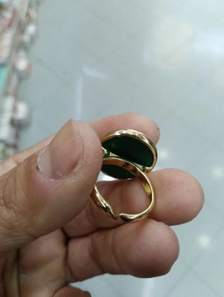 Anello con pietra verde occhio di gatto
