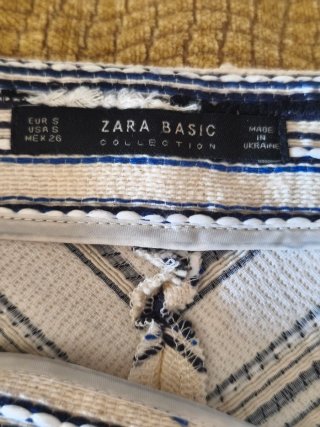 Falda mini con cadeneta azul y beige