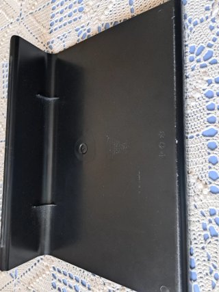 Soporte para portátil negro con círculos