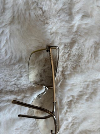 Gafas de sol Gucci doradas y plateadas