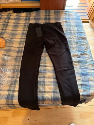 Pantalones negros con detalle ROSE