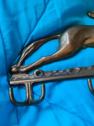 Colgador antiguo jinete a caballo