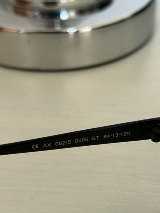 Gafas de sol Armani Exchange negras.