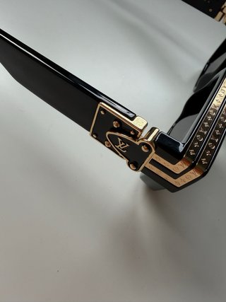 Occhiali da sole Louis Vuitton neri e dorati