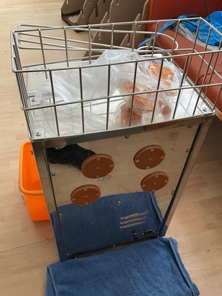 Exprimidor de naranjas automático