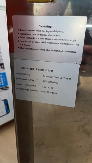 Exprimidor de naranjas automático