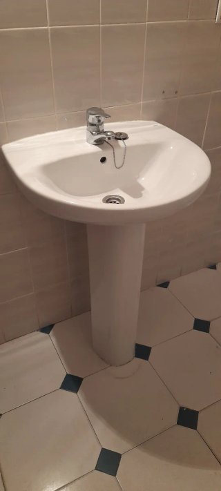 Lavabo de pie de cerámica blanco
