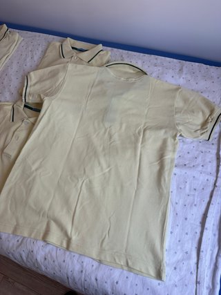 Lote 5 polos CEU amarillos 10€ la unidad  Talla 18