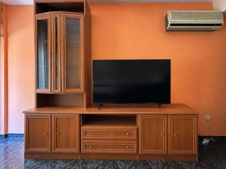 Mueble de salón madera y cristal
