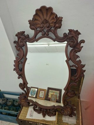 Espejo de madera tallada