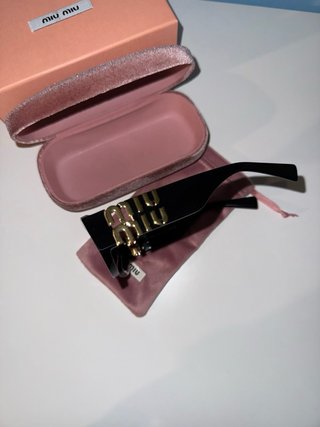Occhiali da sole Miu Miu neri donna
