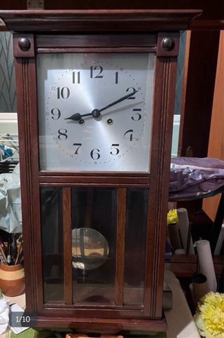 Reloj de péndulo antiguo de madera