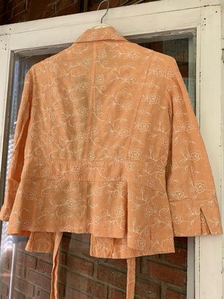 Giubbotto floreale arancione da donna