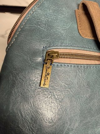 Mochila azul y marrón con estampado
