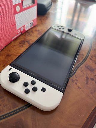Nintendo Switch OLED + Funda