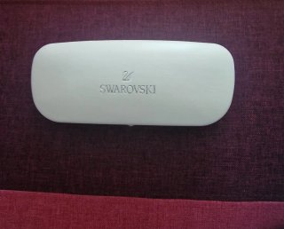 Gafas de sol Swarovski rosas y moradas