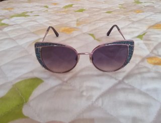 Gafas de sol Swarovski rosas y moradas