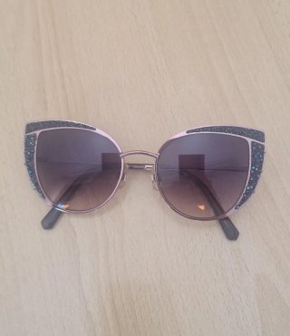 Gafas de sol Swarovski rosas y moradas