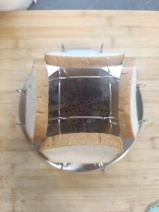 Tostador de pan para hornillo de gas