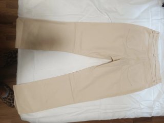 Pantalones Primark tipo cuero beige T.36