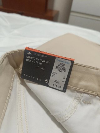 Pantalones Primark tipo cuero beige T.36