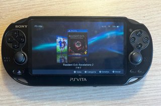 PS VITA OLED con Magia + scheda 16GB + caricabatterie