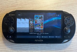 PS VITA OLED con Magia + scheda 16GB + caricabatterie