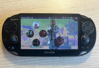 PS VITA OLED con Magia + scheda 16GB + caricabatterie