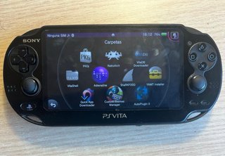PS VITA OLED con Magia + scheda 16GB + caricabatterie