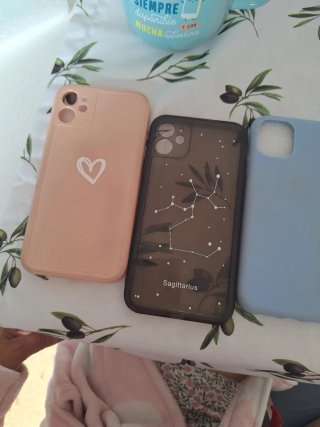 2 Fundas para móvil: Astronauta y Caras Sonrientes