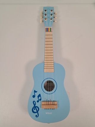 Guitarra de juguete Woet con libro