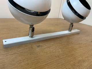 Applique vintage stile occhio con due faretti