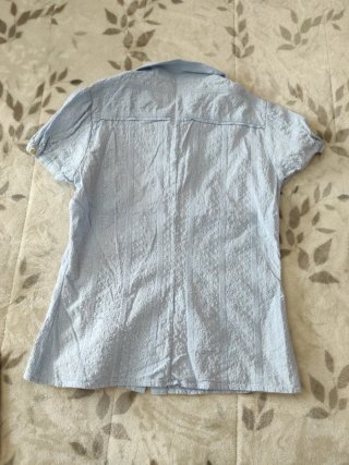 Purificación García camisa bordada
