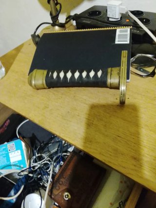 Empuñadura de espada decorativa