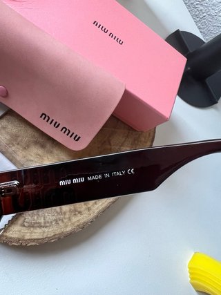 Occhiali da sole polarizzati Miu Miu marroni