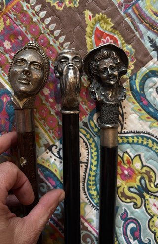 Bastón antiguo de plata con rostro